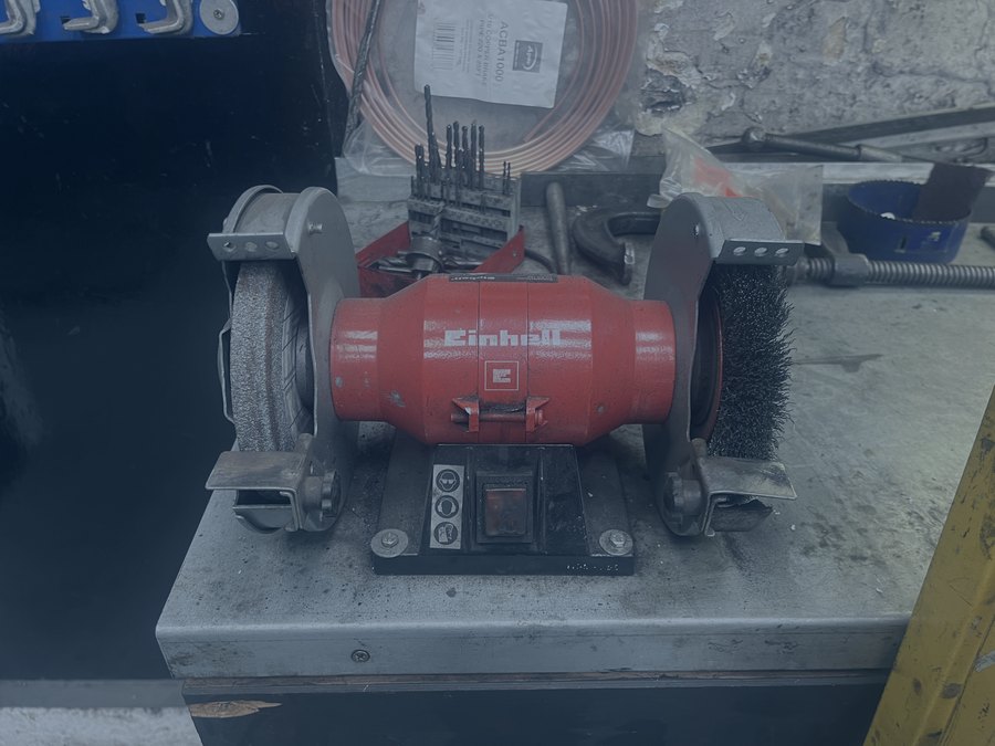 Bench grinder in the R. Taylor Workshop engineering area